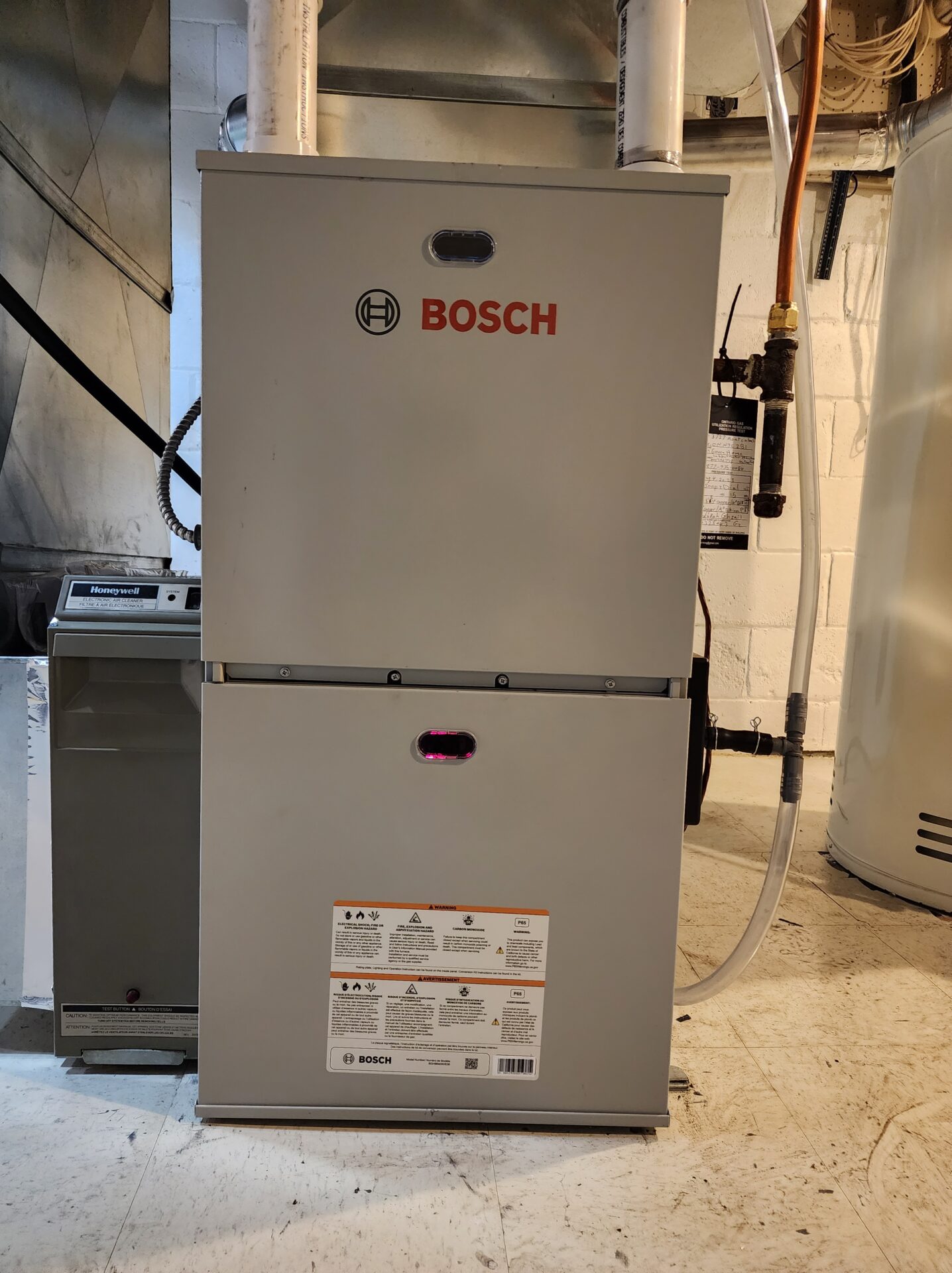 Bosch high-efficiency furnace paired with air handler — London Ontario installation