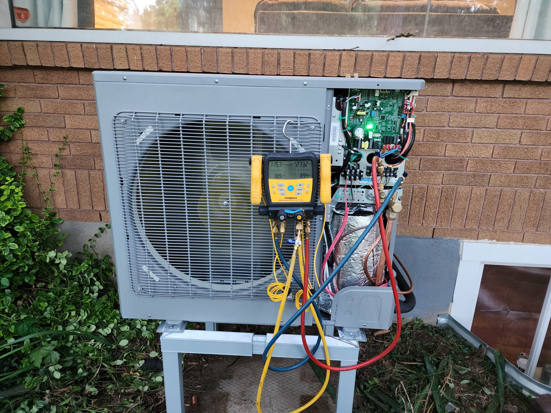 Side-discharge heat pump maintenance and testing