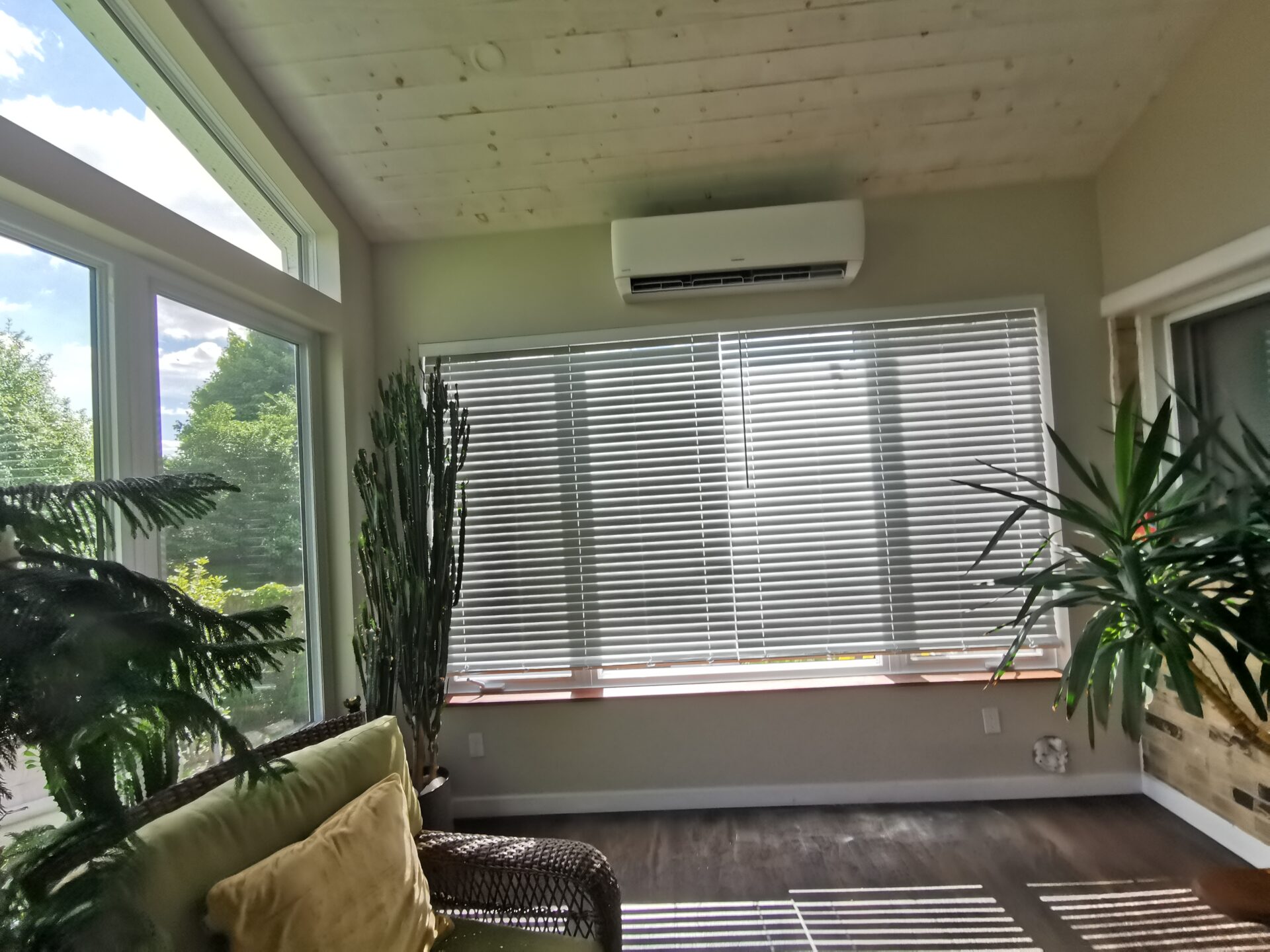 Ductless mini-split AC installation in a sunroom